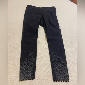 Lululemon black size 8 leggings. Scalloped bottom
